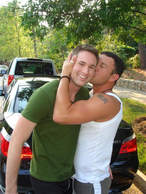 hunks kissing|Guys kissing each other, that's all .